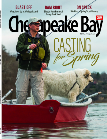 Pictured: Paul on the cover of Chesapeake Bay Magazine with his Great Pyrenees.